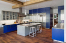 Stainless Steel Cabinets, But Make It Bold (This Navy + Metal Kitchen Slaps)