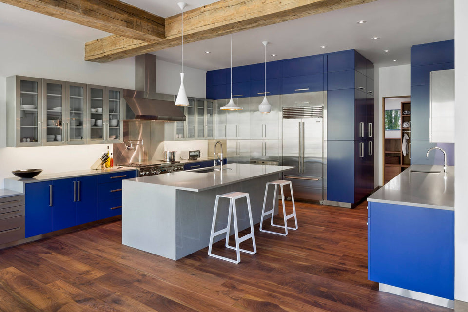 Stainless Steel Cabinets, But Make It Bold (This Navy + Metal Kitchen Slaps)